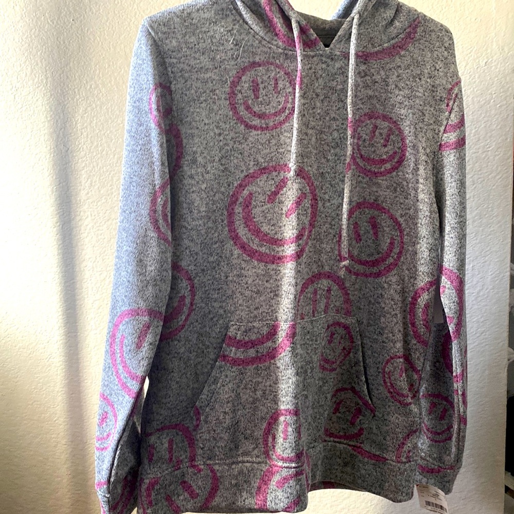 Cute smiley face sweater from Brooklyn cloths. Brand new with tags